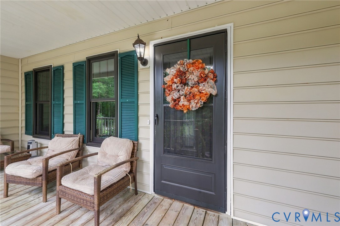 133 Ford Road Bumpass, VA 23024 - Photo 45 of 55 Covered porch with wood-finish decking, horizontal