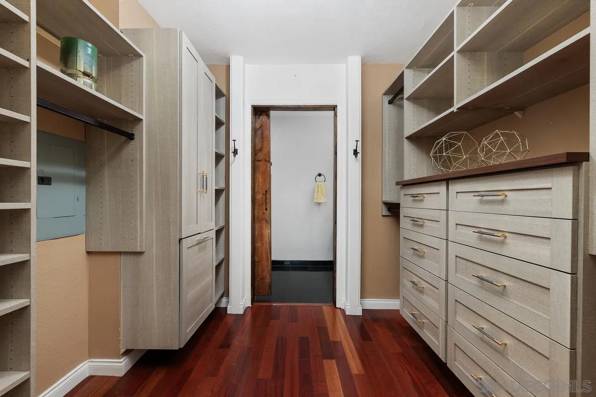 1784 Pala Lake Drive Fallbrook, CA 92028 - Photo 13 of 31 a view of walk in closet with wooden floor