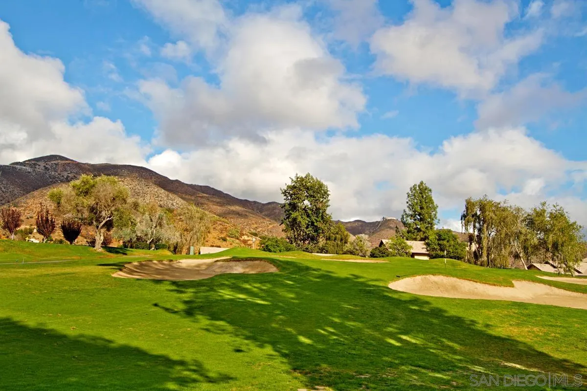 1784 Pala Lake Drive Fallbrook, CA 92028 - Photo 24 of 31 a view of grassy field with mountain