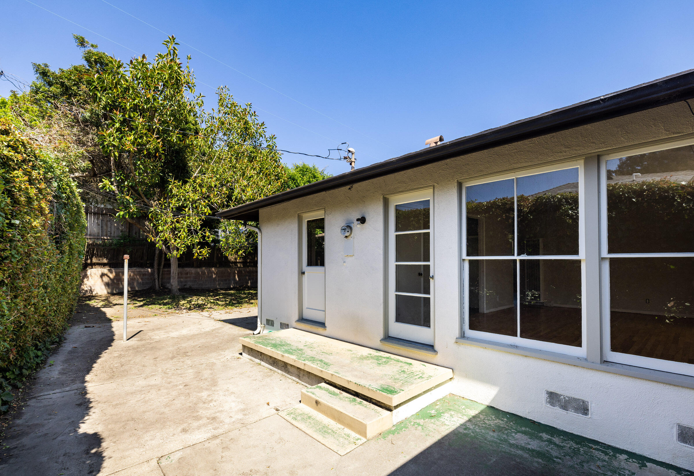 238 San Rafael Avenue Santa Barbara, CA 93109 - Photo 13 of 13 a front view of a house with a yard
