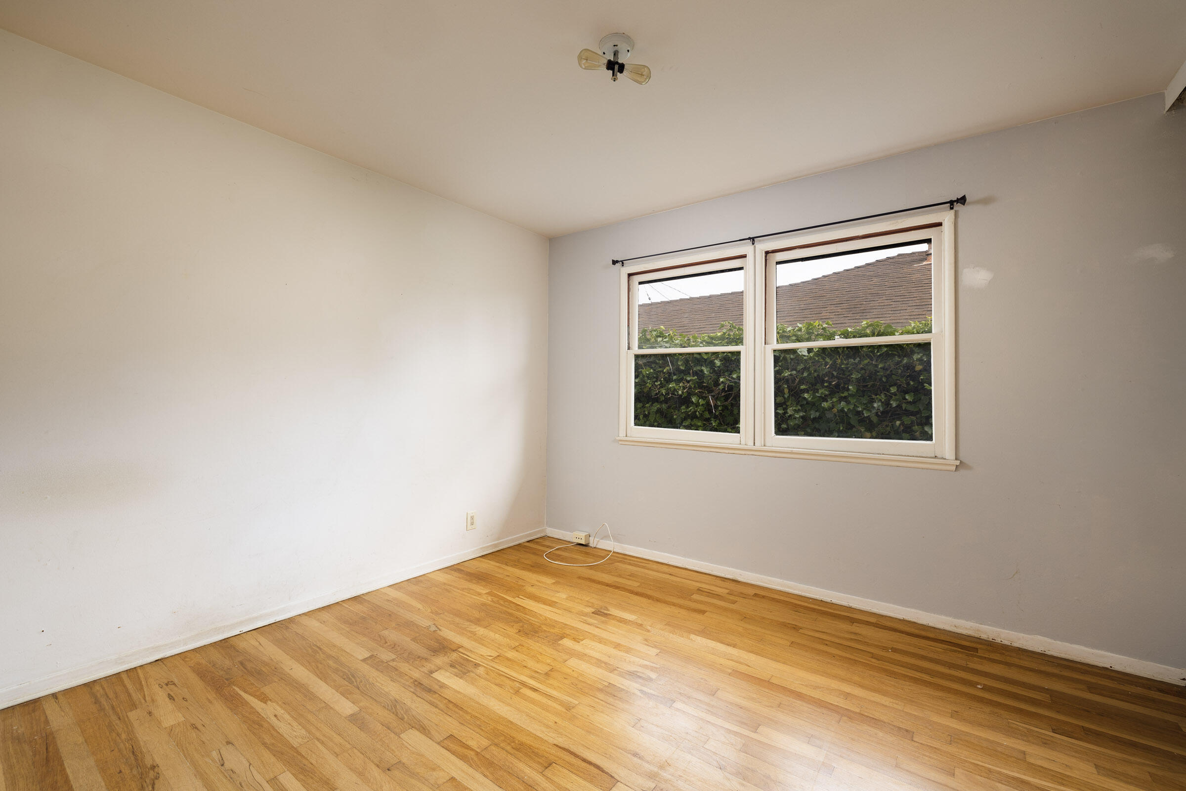 238 San Rafael Avenue Santa Barbara, CA 93109 - Photo 8 of 13 a view of an empty room with a window