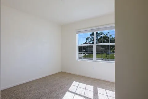 an empty room with a window