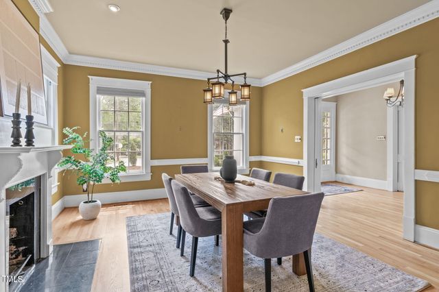 a kitchen with stainless steel appliances granite countertop a stove sink and cabinets