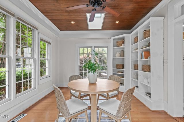 a view of a hallway with a livingroom