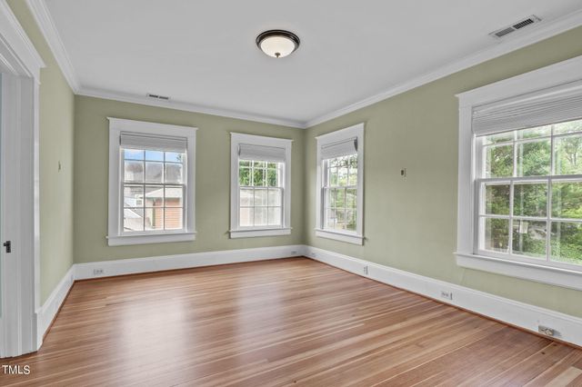 a bed room with a bed and a fireplace