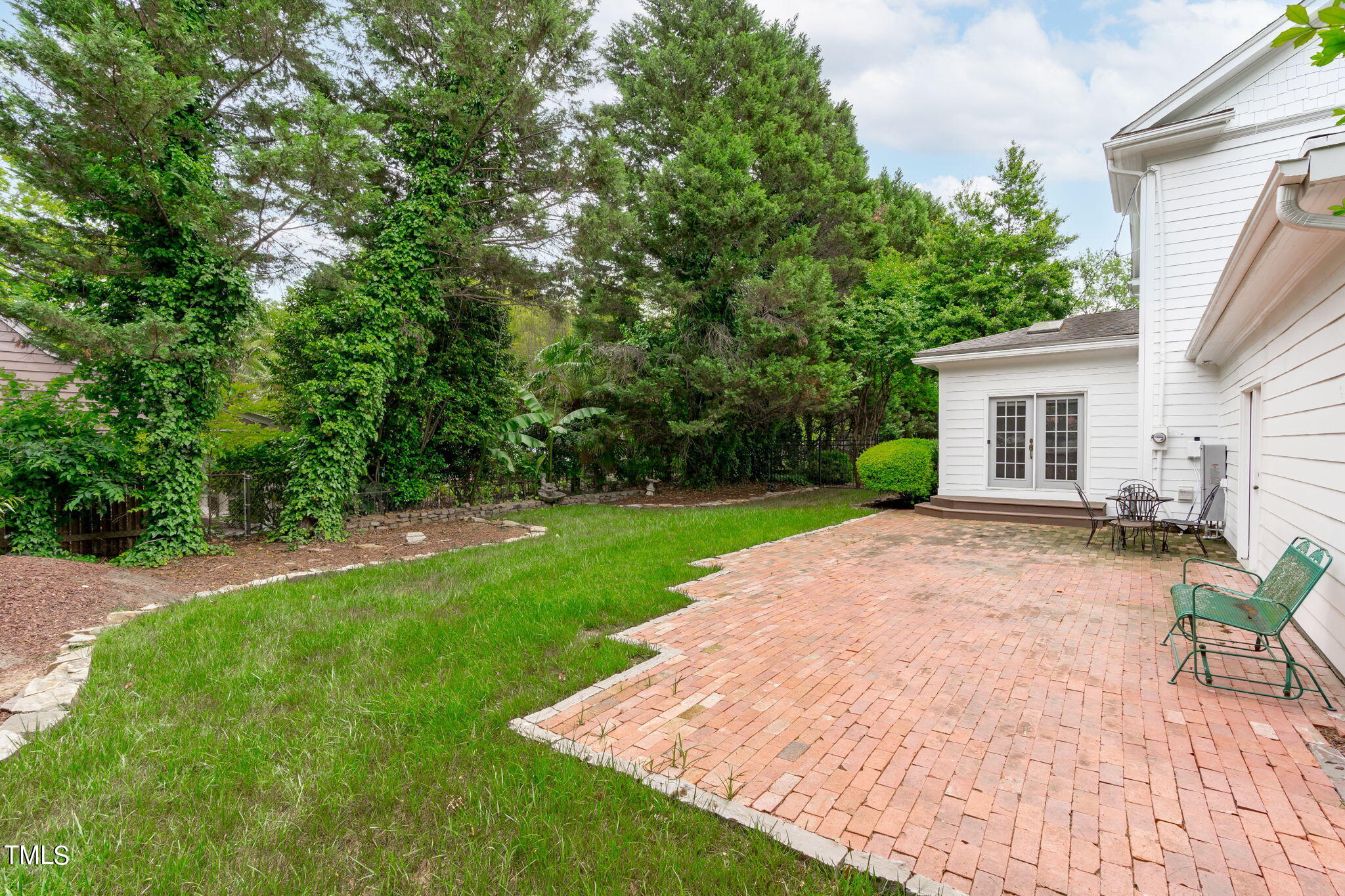 1315 Wake Forest Road Raleigh, NC 27604 - Photo 54 of 68 a view of backyard of house with green space