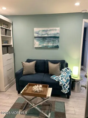 a living room with furniture and decor