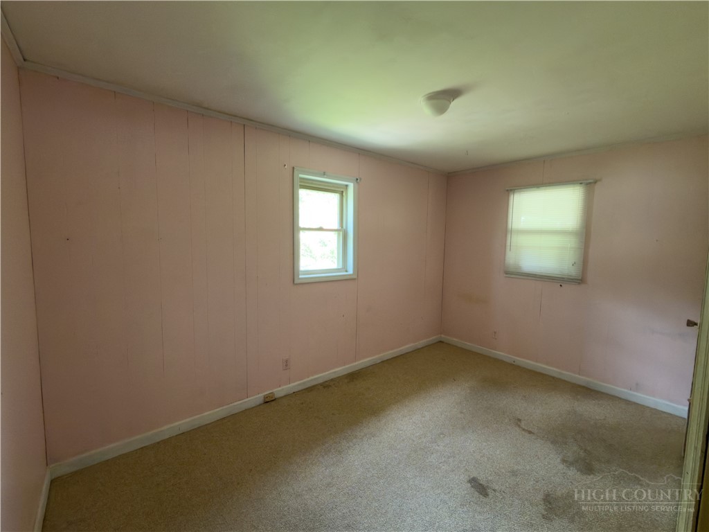 1205 Bamboo Road Boone, NC 28607 - Photo 5 of 17 an empty room with a window