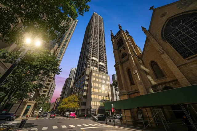 a view of a building with a street