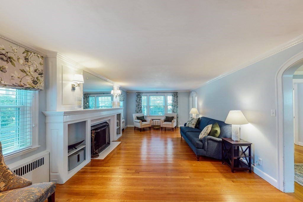 14 Gordon Road Milton, MA 02186 - Photo 12 of 38 a living room with furniture and a fireplace