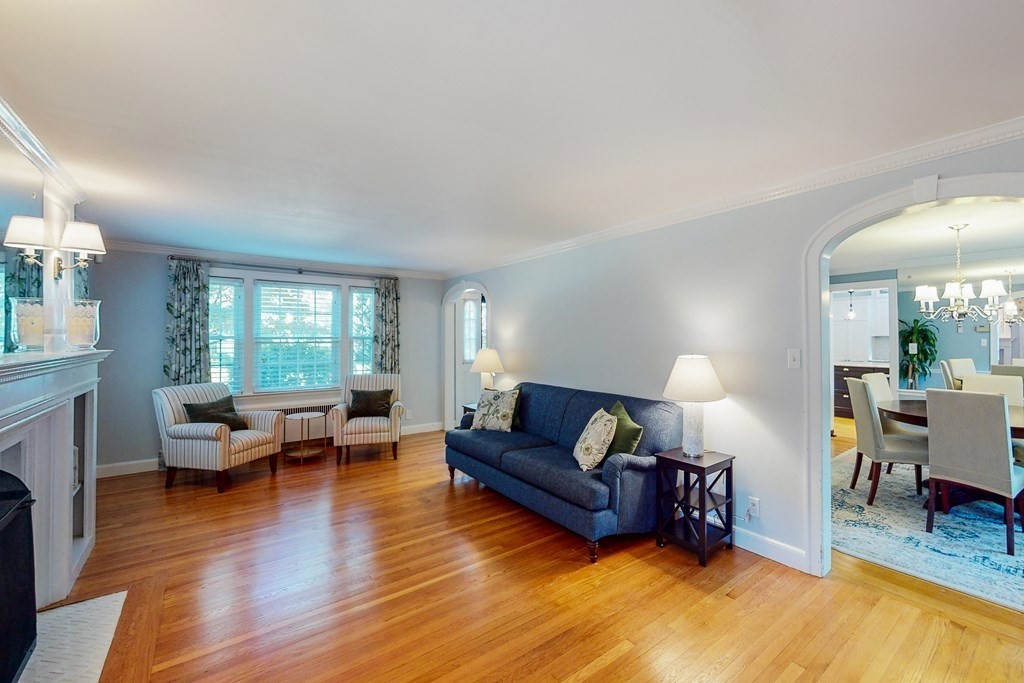 14 Gordon Road Milton, MA 02186 - Photo 14 of 38 a living room with furniture and a fireplace