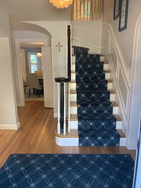 14 Gordon Road Milton, MA 02186 - Photo 18 of 38 view of entryway with wooden floor and stairs