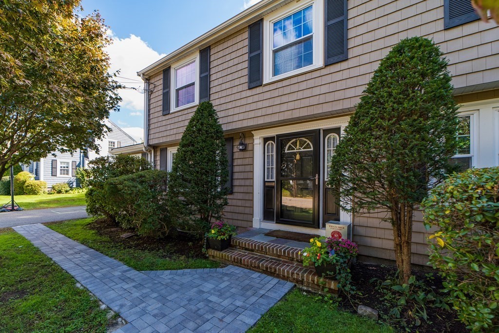 14 Gordon Road Milton, MA 02186 - Photo 2 of 38 a front view of a house with garden