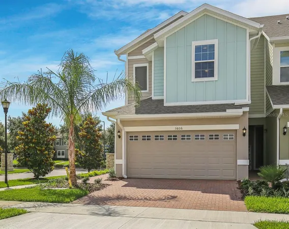 a front view of a house with a garage