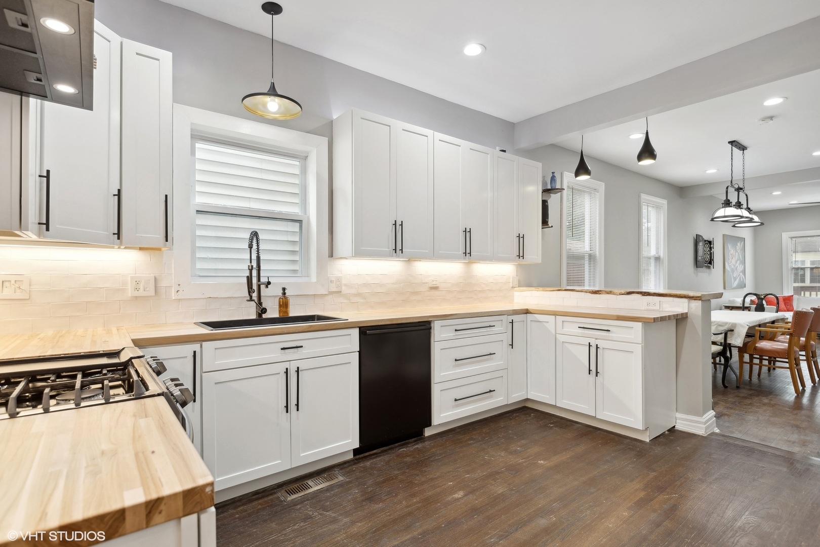 456 West 44th Street, Unit 1 Chicago, IL 60609 - Photo 11 of 19 a kitchen with white cabinets and white appliances