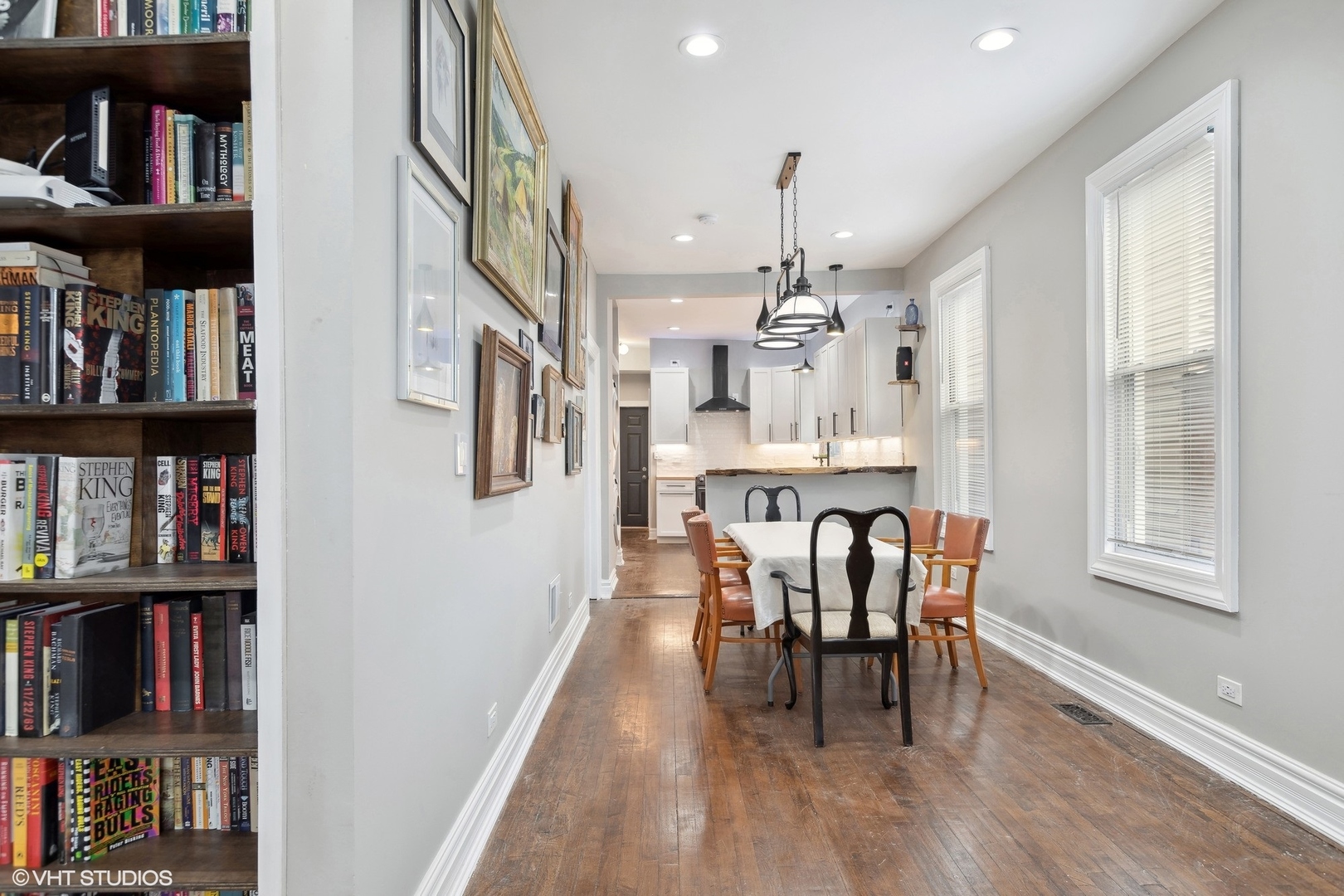456 West 44th Street, Unit 1 Chicago, IL 60609 - Photo 5 of 19 a view of a dining room with furniture and a book shelf