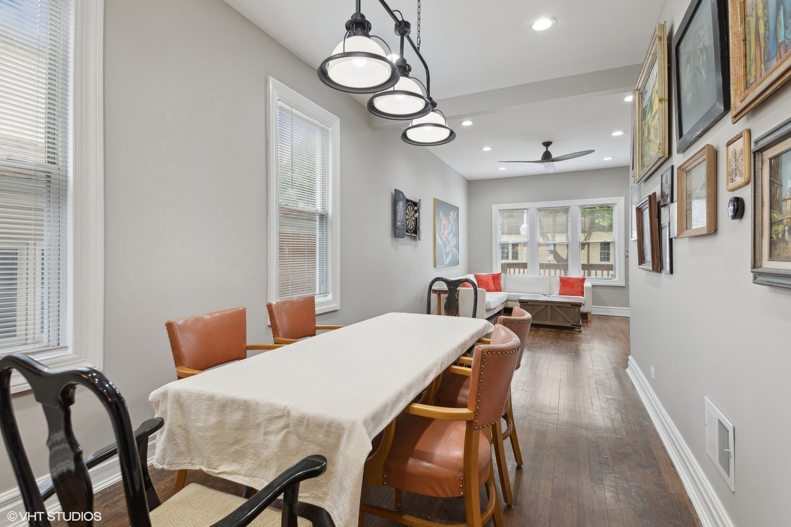 456 West 44th Street, Unit 1 Chicago, IL 60609 - Photo 7 of 19 a living room with furniture a chandelier fan and a window