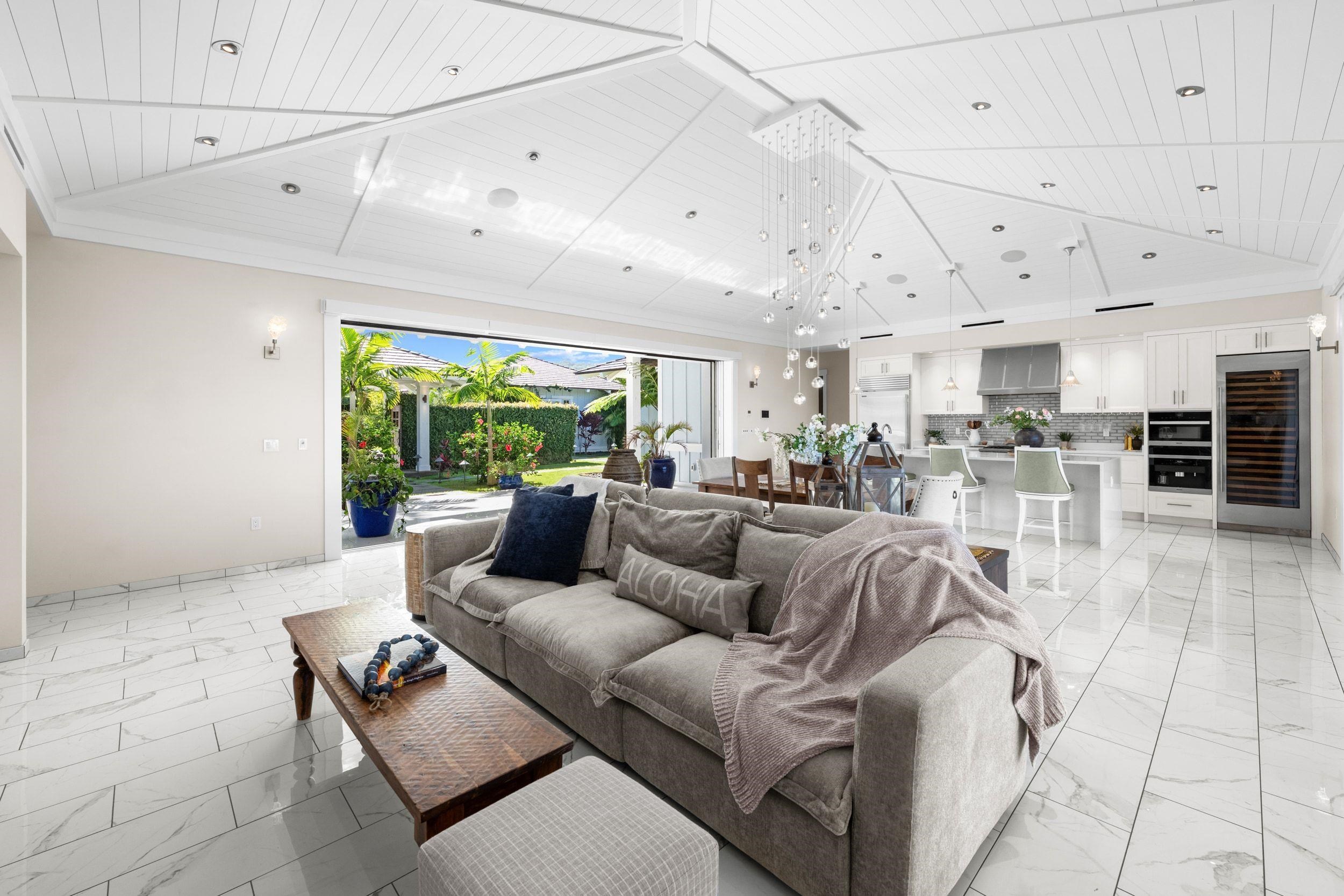 300 Mahana Ridge Street Lahaina, HI 96761 - Photo 12 of 50 a living room with furniture and a large window