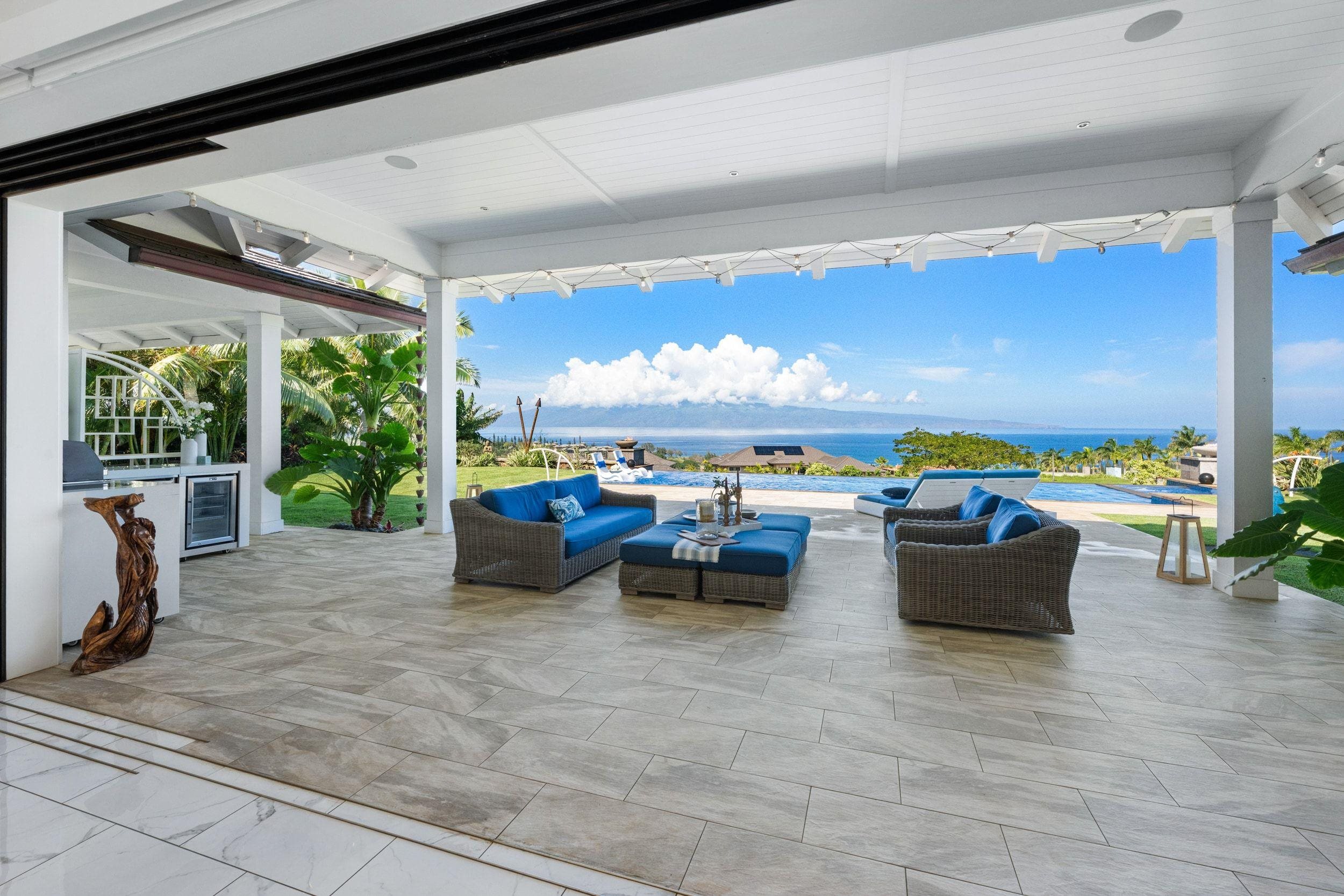 300 Mahana Ridge Street Lahaina, HI 96761 - Photo 14 of 50 a view of a patio with couches and potted plants