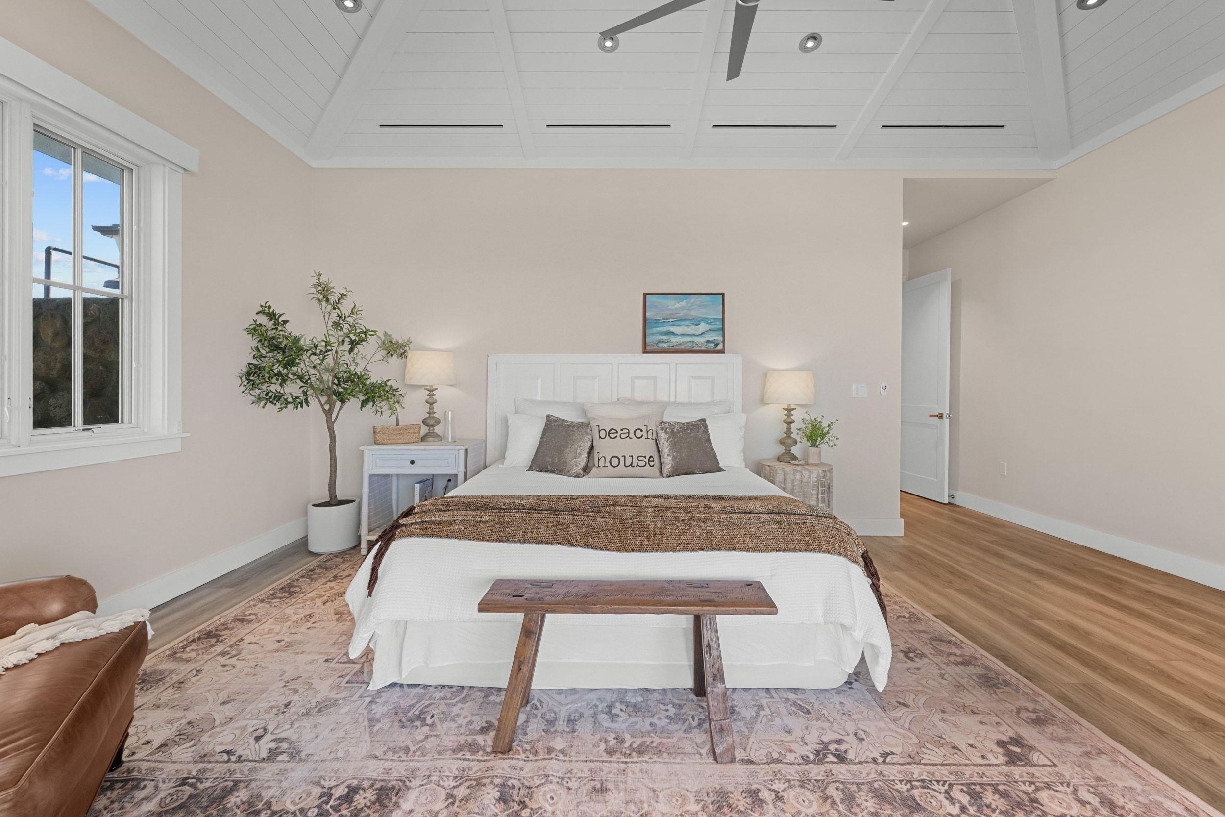 300 Mahana Ridge Street Lahaina, HI 96761 - Photo 23 of 50 a bedroom with a bed and a potted plant