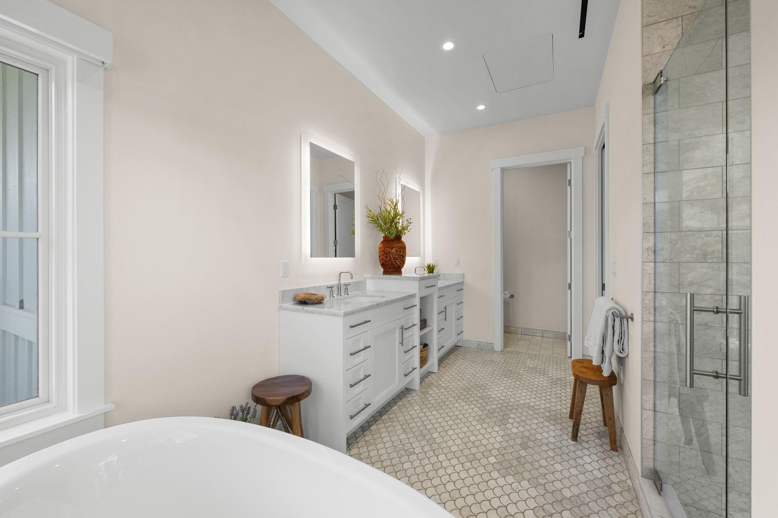 300 Mahana Ridge Street Lahaina, HI 96761 - Photo 26 of 50 a bathroom with a double vanity sink toilet and shower