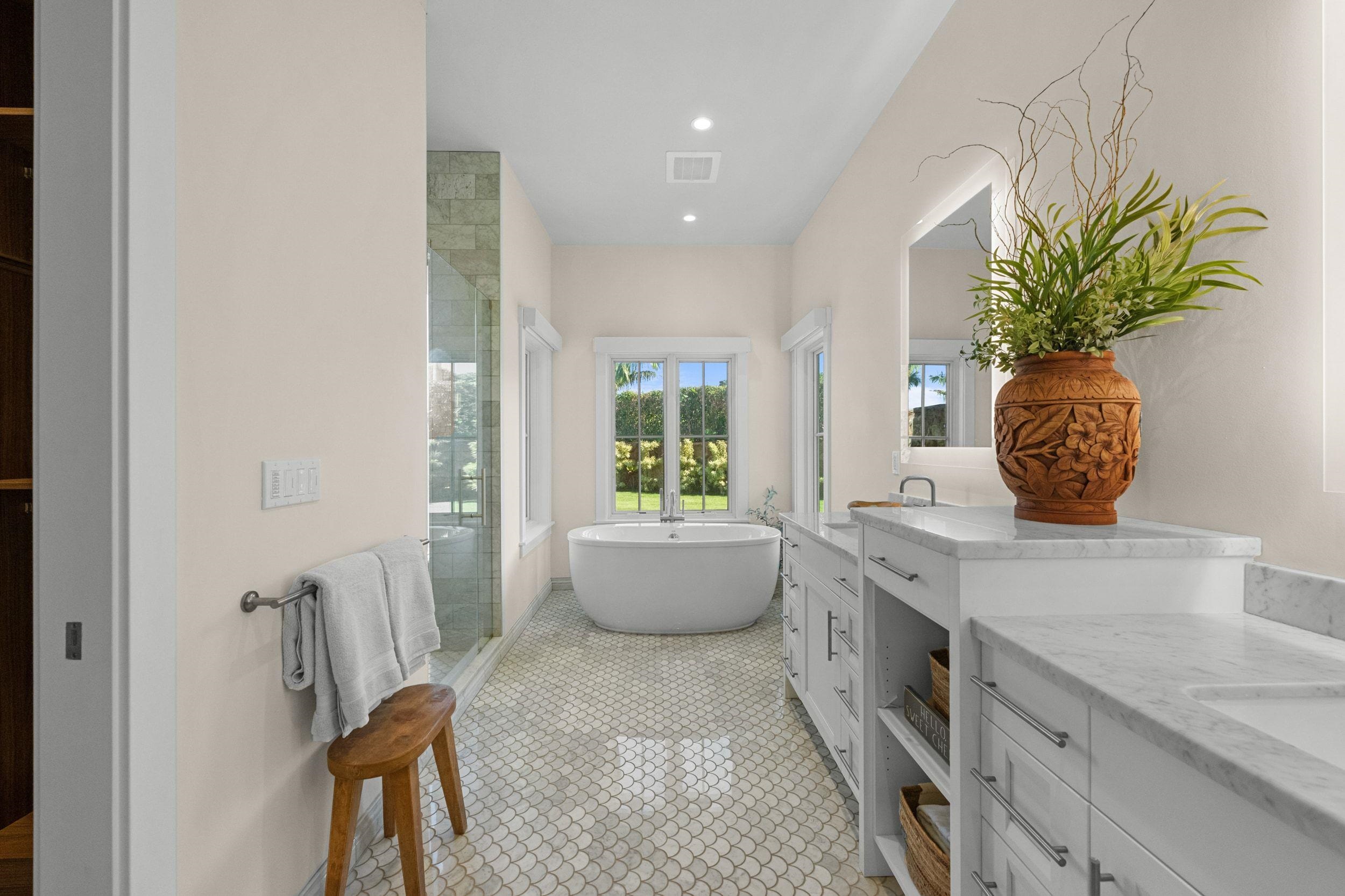 300 Mahana Ridge Street Lahaina, HI 96761 - Photo 27 of 50 a living room with furniture and a potted plant