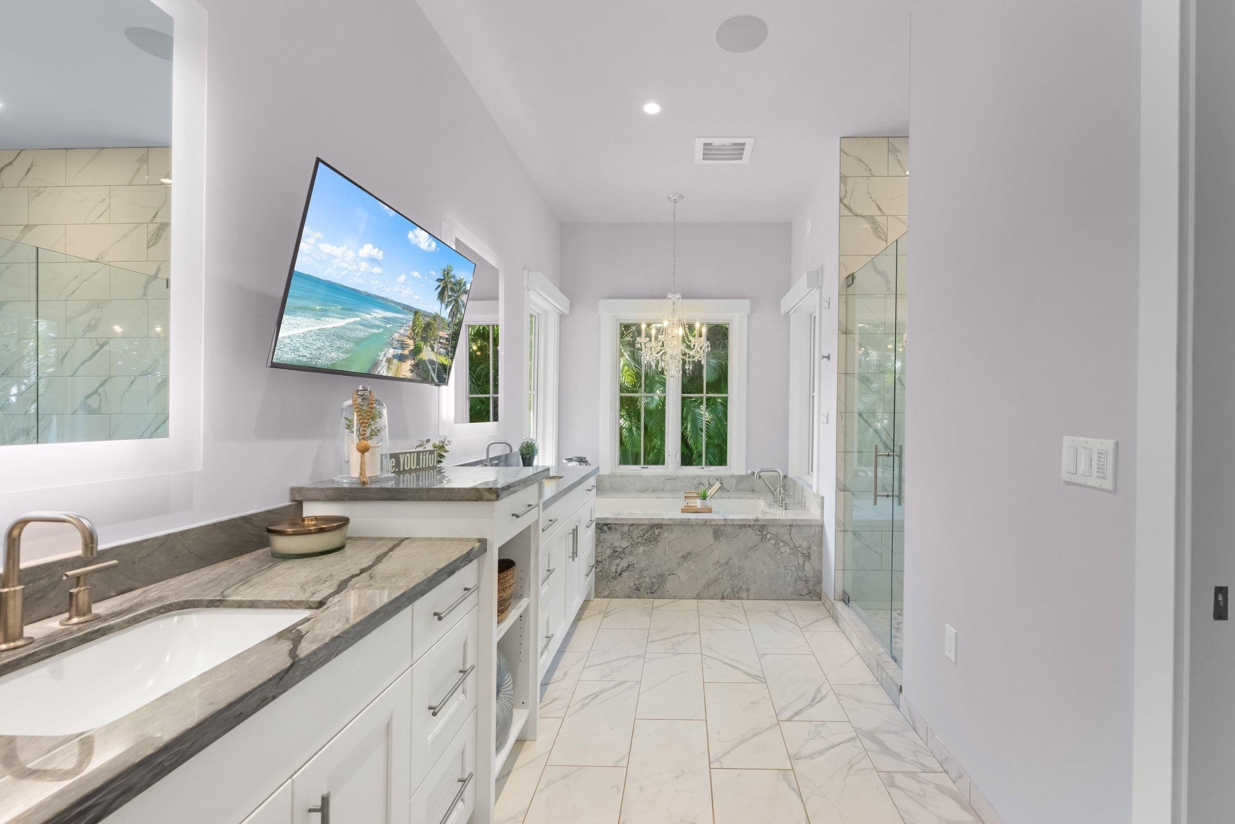 300 Mahana Ridge Street Lahaina, HI 96761 - Photo 36 of 50 a view of a kitchen with a sink and a large mirror next to a window