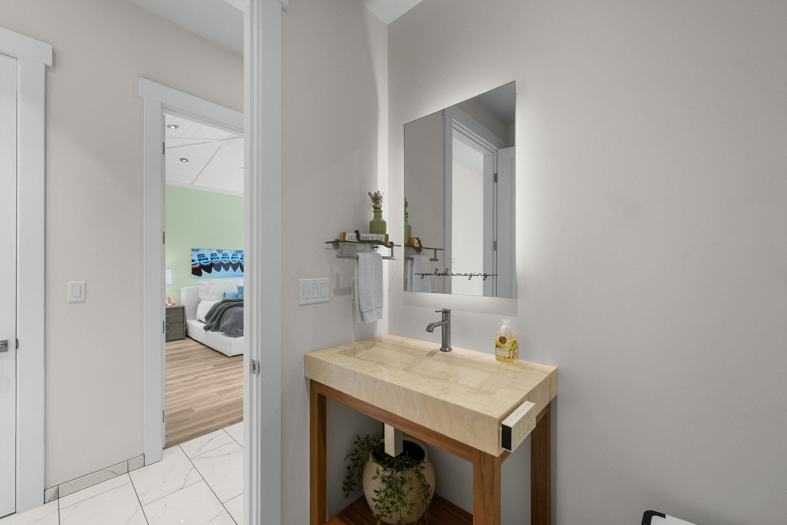 300 Mahana Ridge Street Lahaina, HI 96761 - Photo 42 of 50 a bathroom with a sink and a mirror