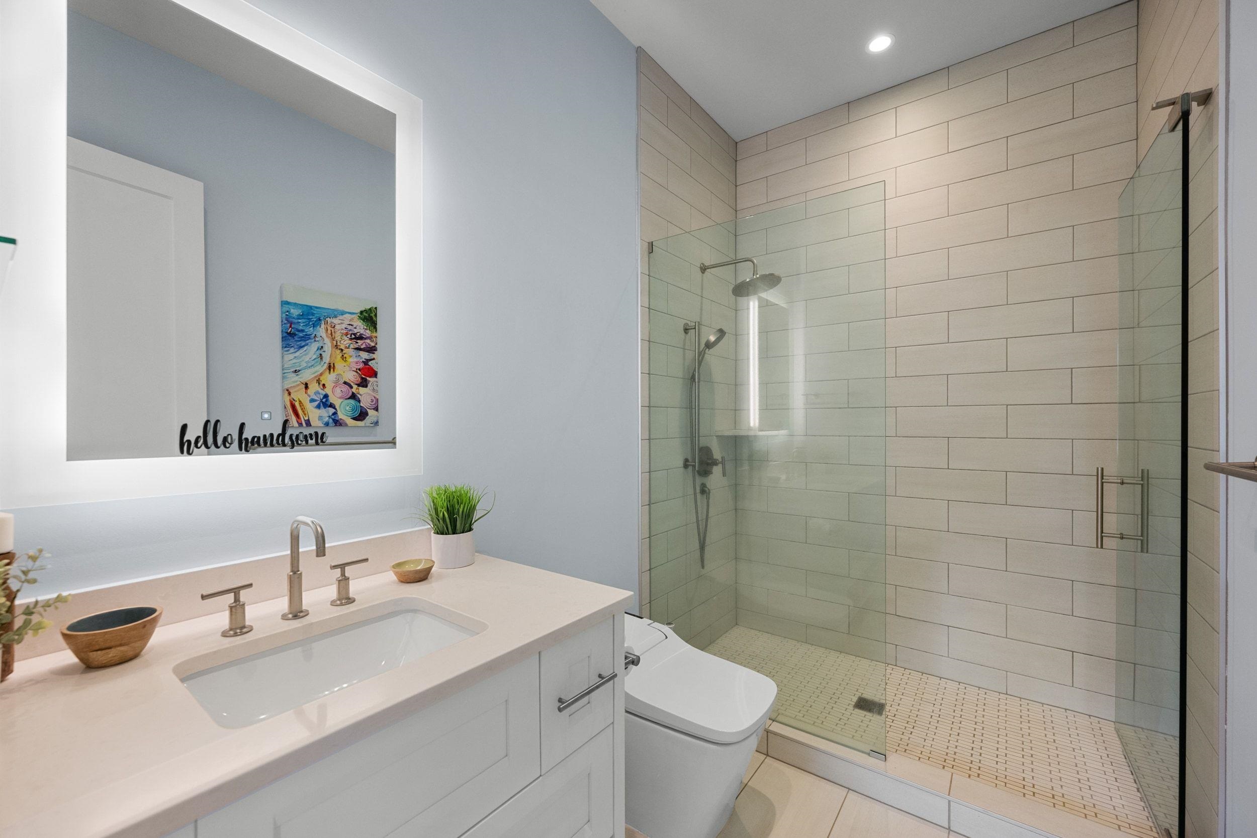 300 Mahana Ridge Street Lahaina, HI 96761 - Photo 45 of 50 a bathroom with a sink toilet and shower