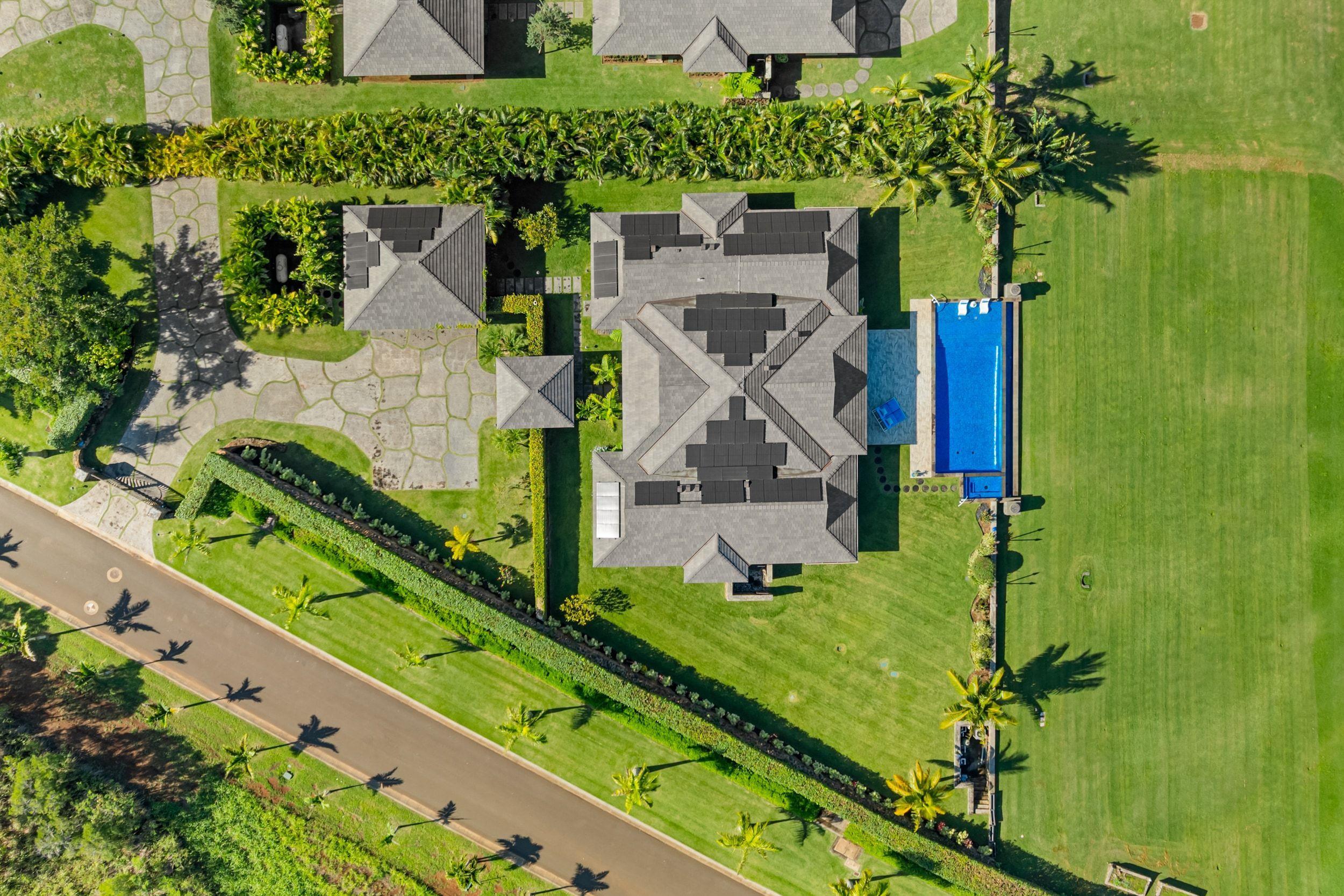 300 Mahana Ridge Street Lahaina, HI 96761 - Photo 49 of 50 an aerial view of a house with a garden