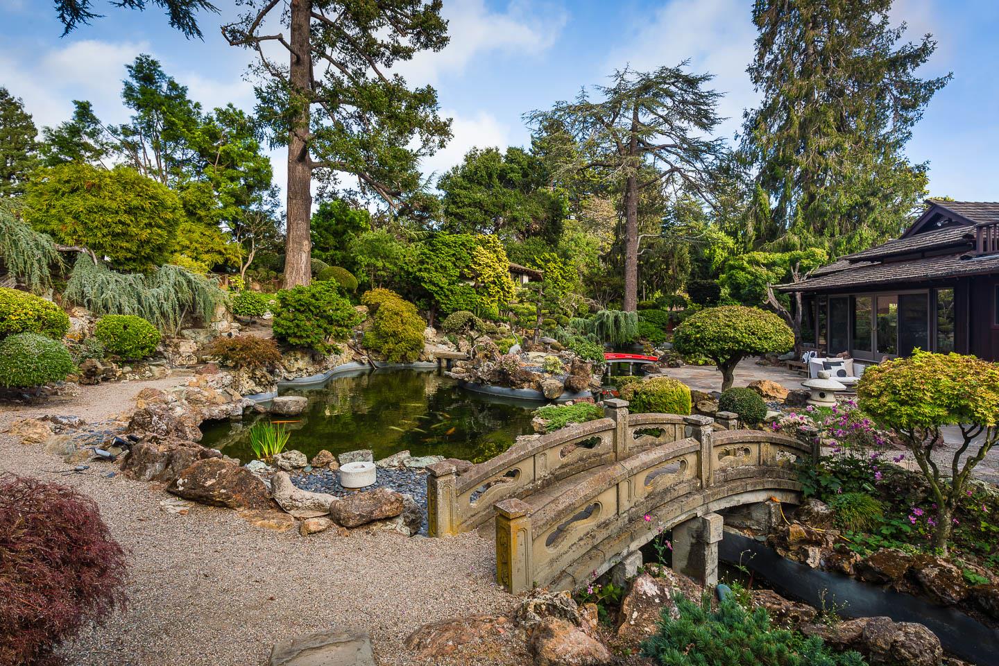 70 De Sabla Road San Mateo, CA 94402 - Photo 12 of 17 a view of a house with a yard and sitting area