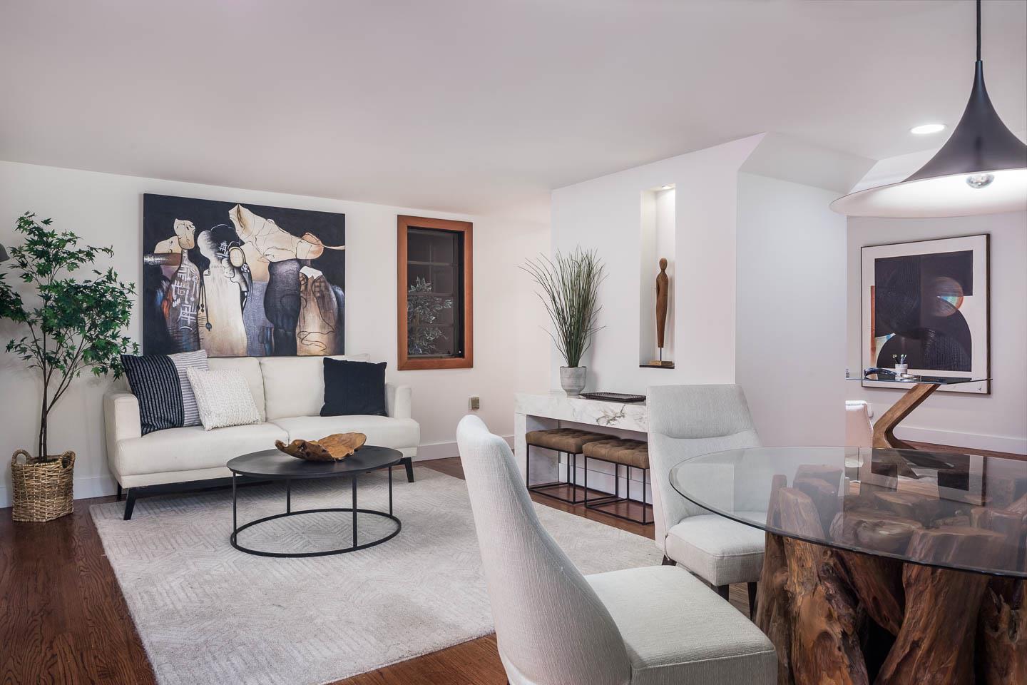 70 De Sabla Road San Mateo, CA 94402 - Photo 15 of 17 a living room with furniture and a painting on the wall