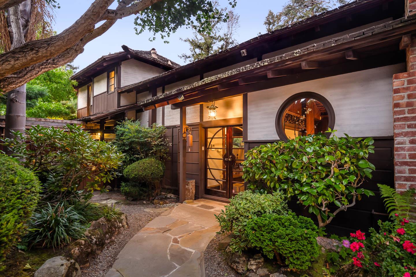 70 De Sabla Road San Mateo, CA 94402 - Photo 2 of 17 a front view of a house with a garden