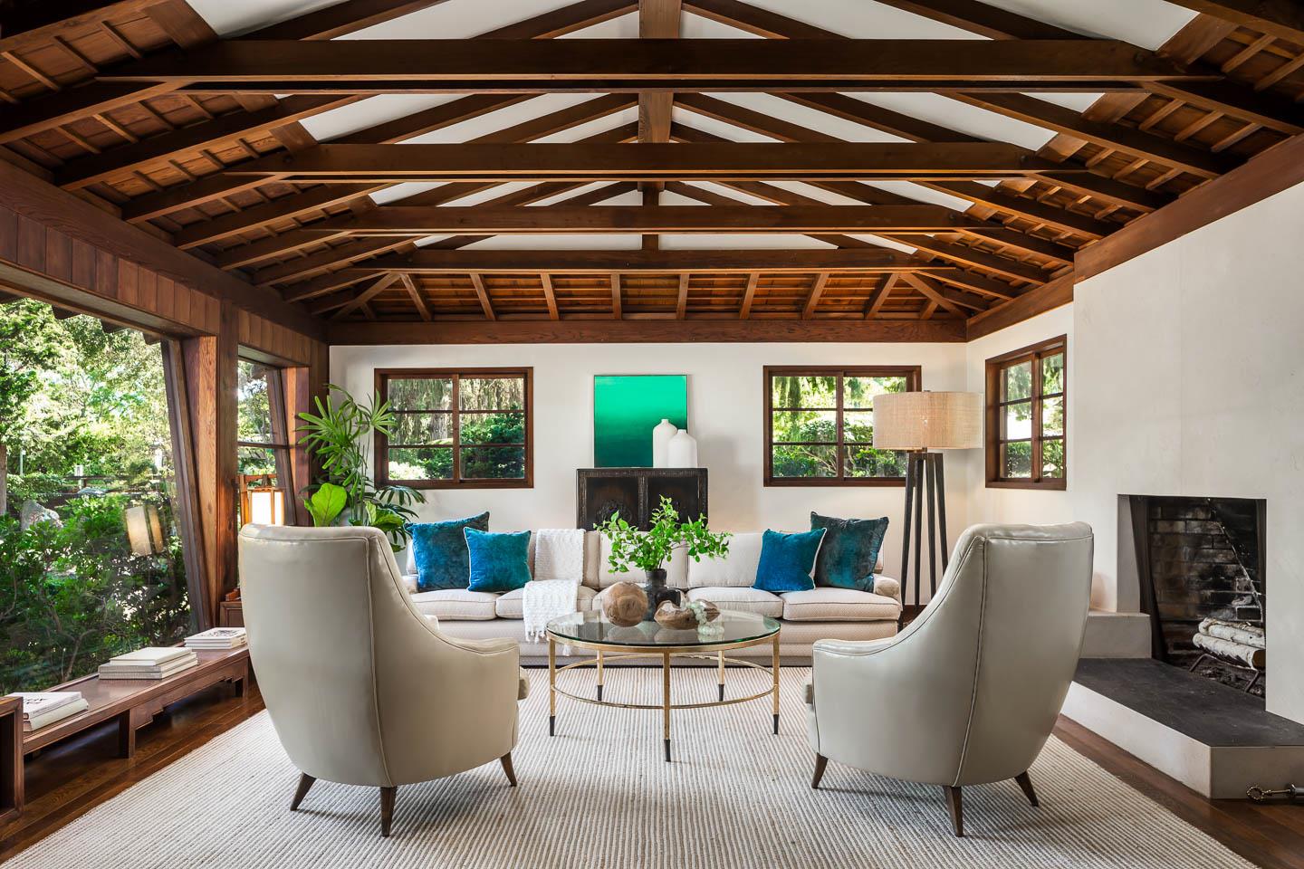 70 De Sabla Road San Mateo, CA 94402 - Photo 3 of 17 a living room with furniture and a chandelier