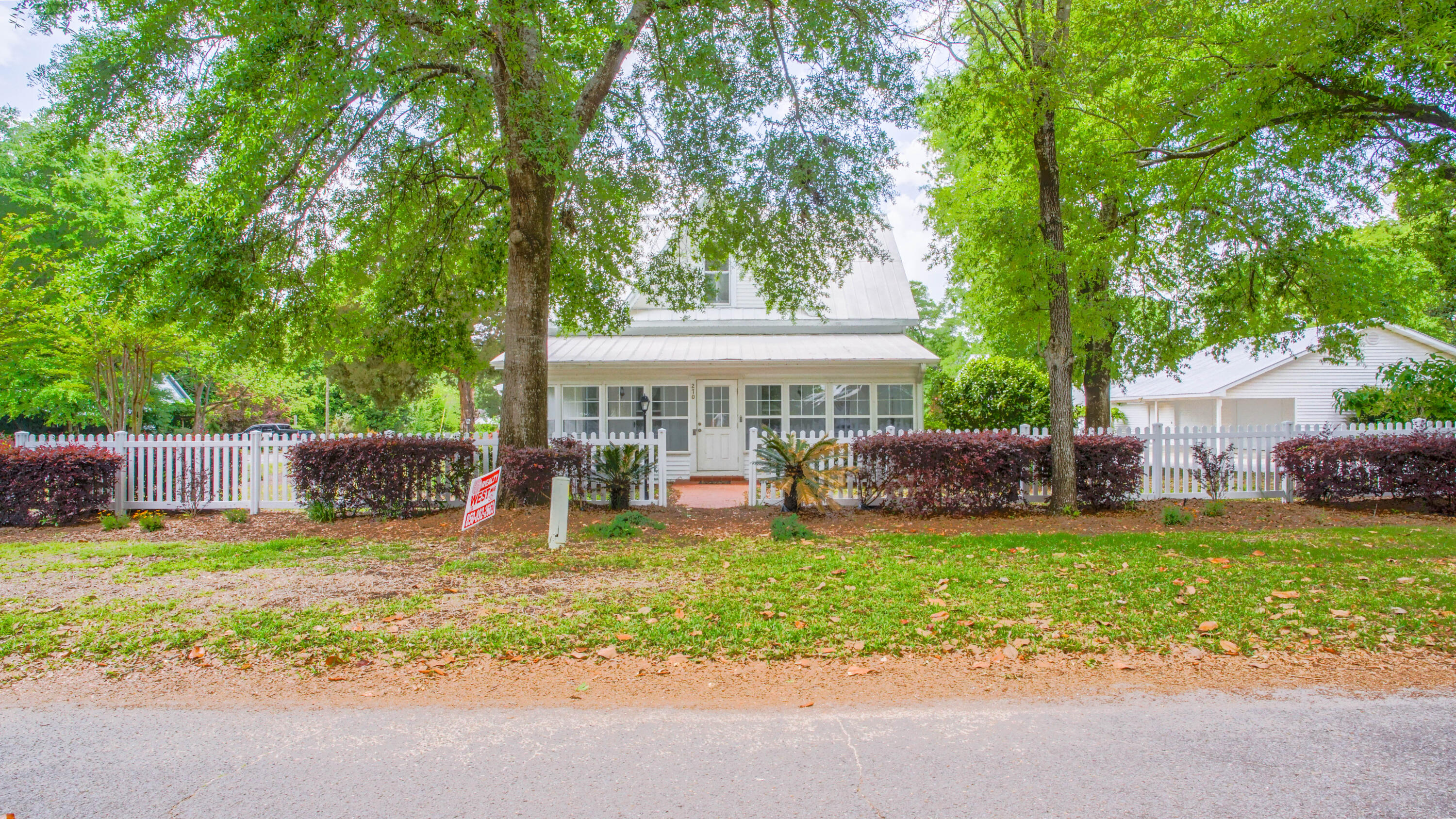 270 South 12th Street DeFuniak Springs, FL 32435 - Photo 3 of 57 a view of a house with swimming pool and sitting area