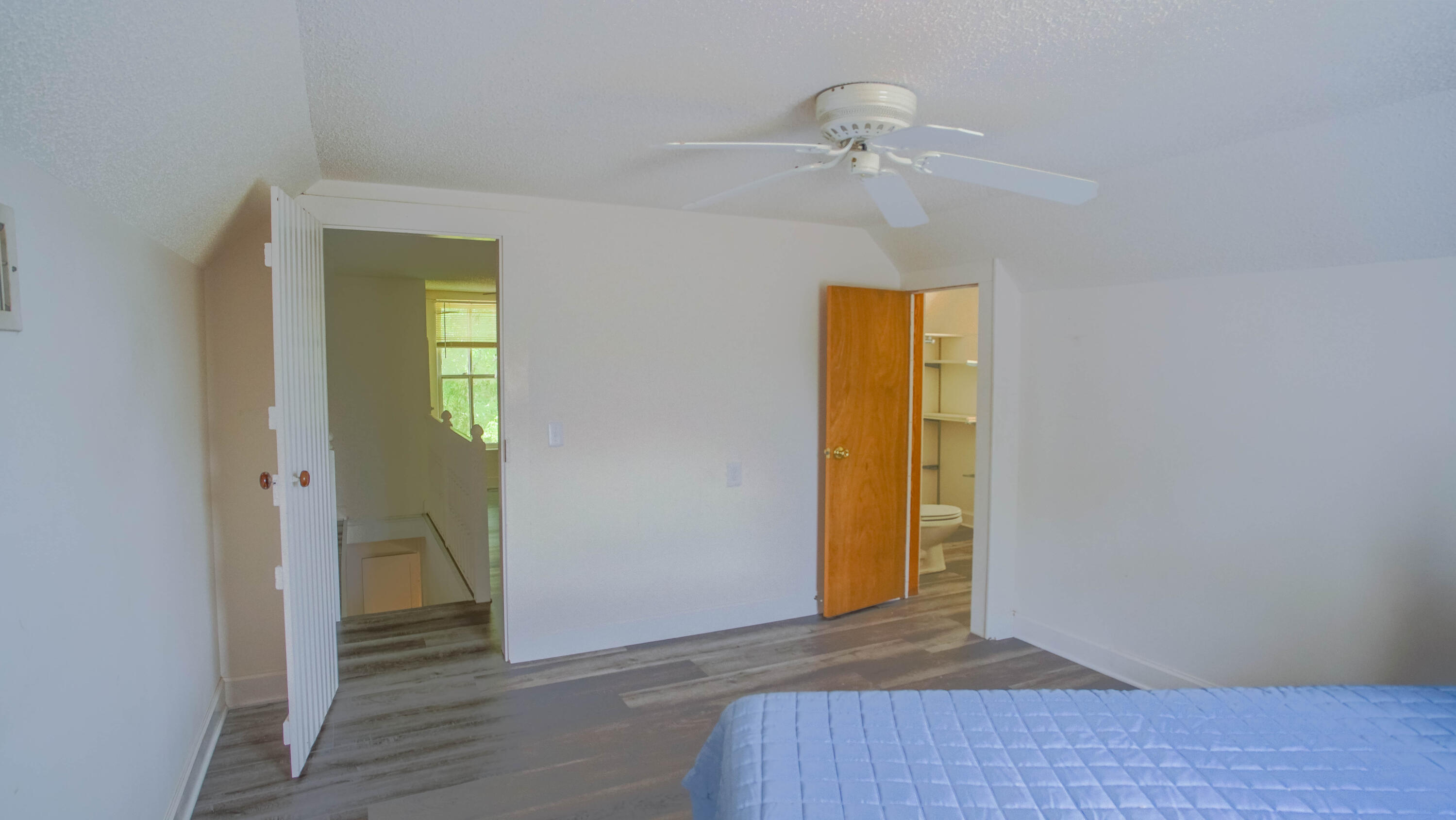 270 South 12th Street DeFuniak Springs, FL 32435 - Photo 34 of 57 a view of empty room with wooden floor and fan
