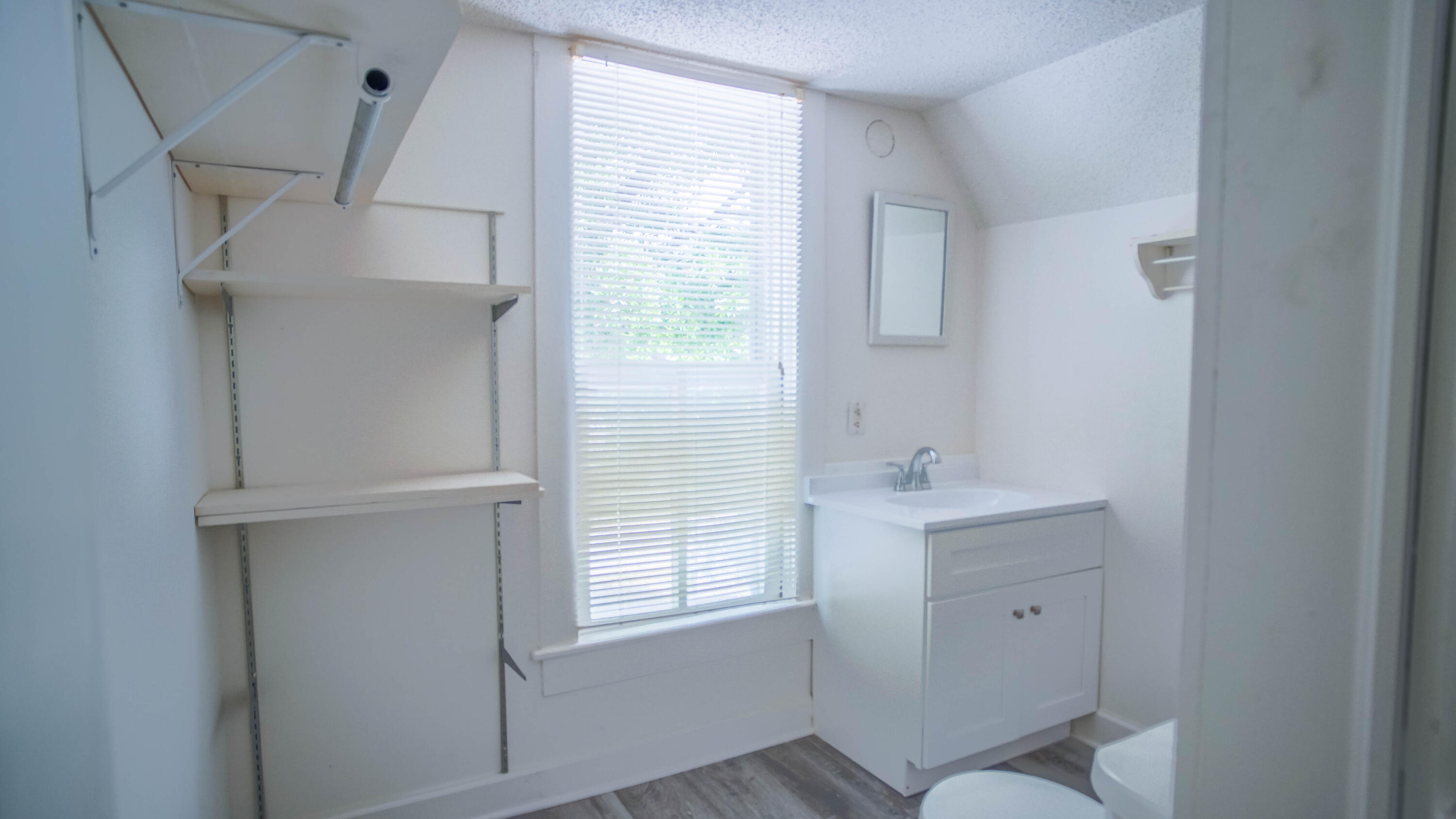 270 South 12th Street DeFuniak Springs, FL 32435 - Photo 35 of 57 a bathroom with a sink toilet and tub