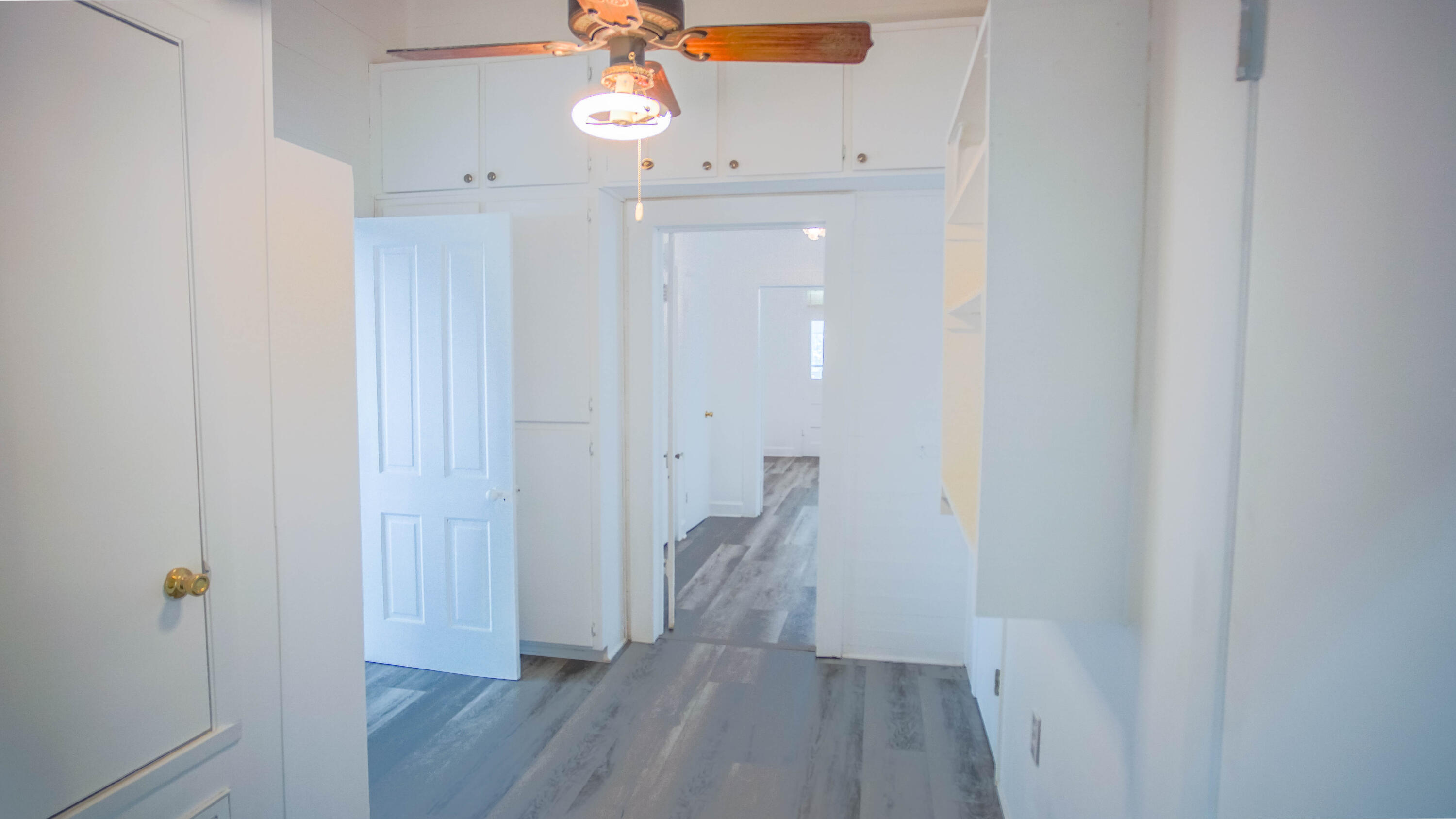 270 South 12th Street DeFuniak Springs, FL 32435 - Photo 41 of 57 a view of a room with wooden floor
