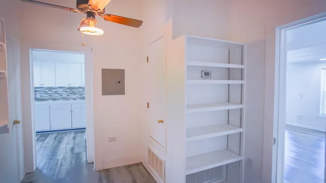 a view of a hallway with washer and dryer