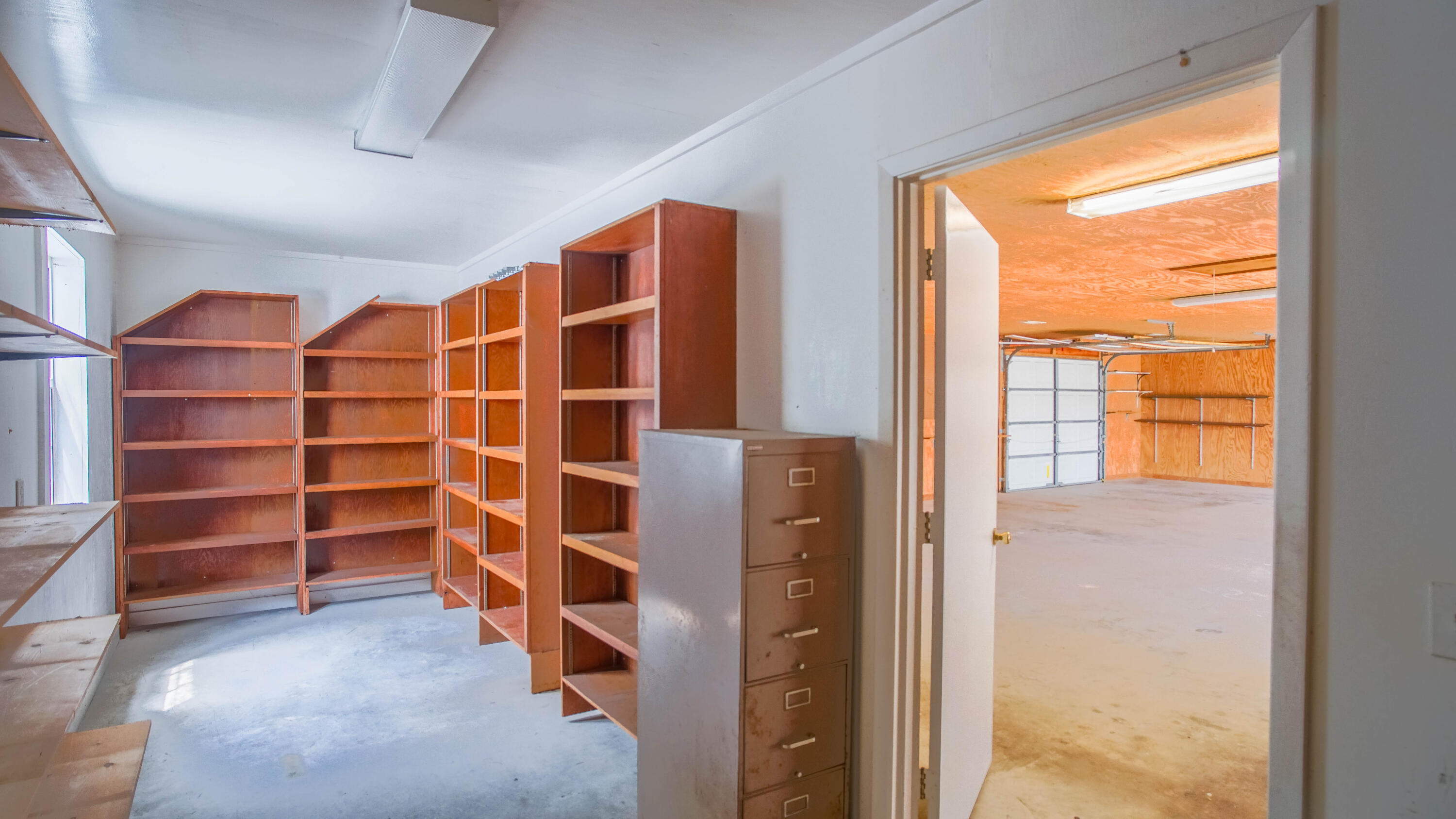 270 South 12th Street DeFuniak Springs, FL 32435 - Photo 51 of 57 a view of walk in closet with empty racks