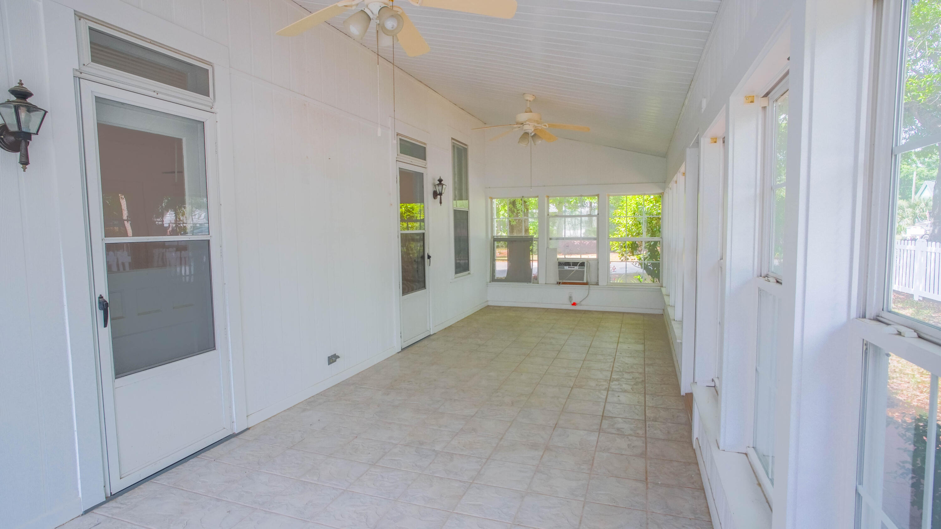 270 South 12th Street DeFuniak Springs, FL 32435 - Photo 56 of 57 a view of hallway with livingroom and wooden floor