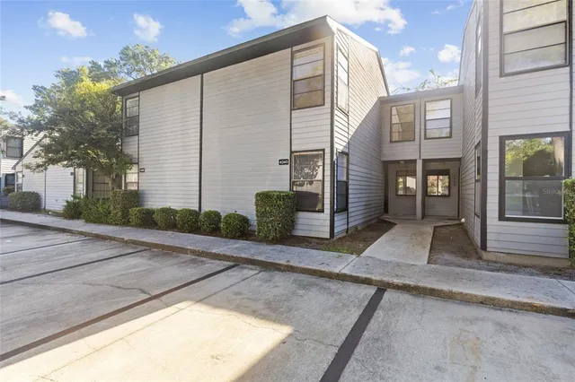 a view of a house with a street