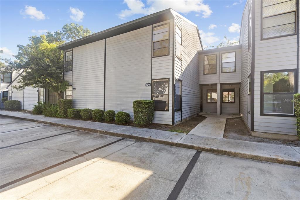 a view of a house with a street
