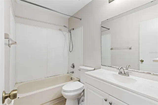 a bathroom with a sink toilet and a bathtub