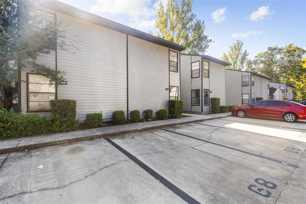 4345 Southwest 20th Lane Gainesville, FL 32607 - Photo 17 of 17 a red and white house with a yard