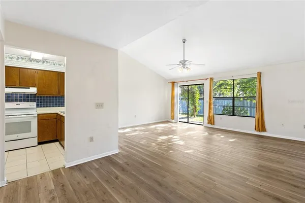a view of an empty room with a window
