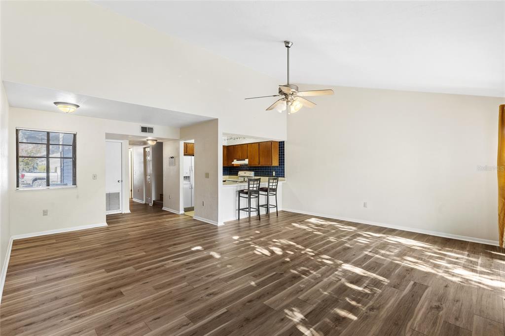 4345 Southwest 20th Lane Gainesville, FL 32607 - Photo 5 of 17 a view of empty room with a sink and chandelier
