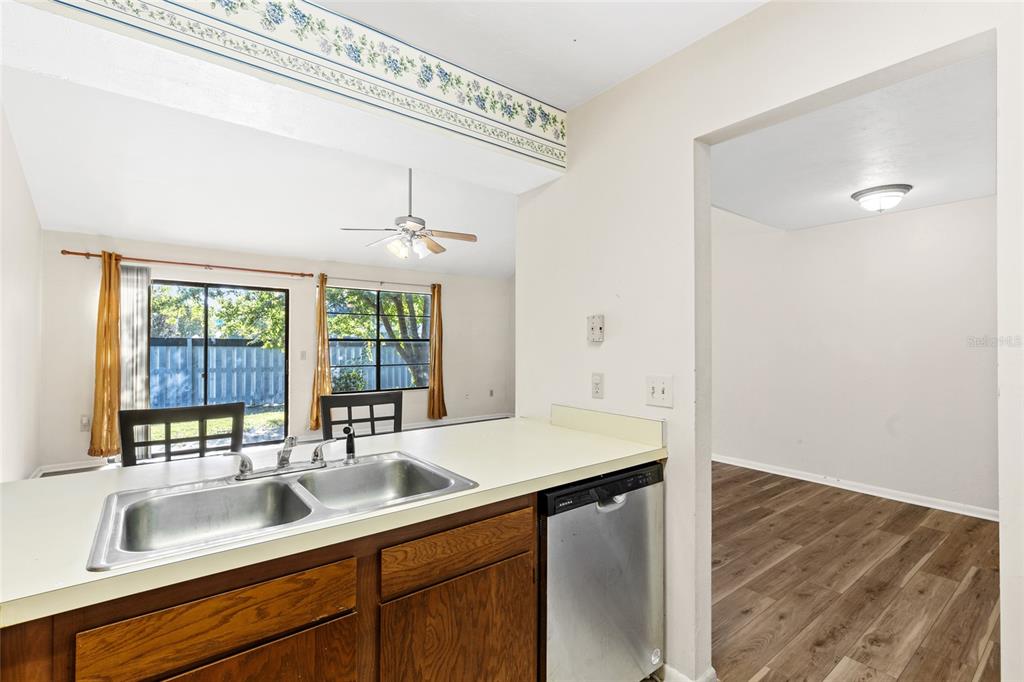 4345 Southwest 20th Lane Gainesville, FL 32607 - Photo 10 of 17 a kitchen with a sink and a window