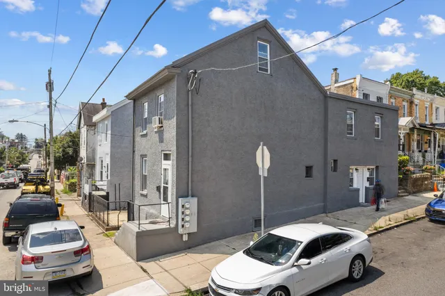 a car parked in front of a building