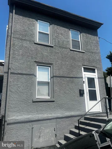 a front view of a house with windows